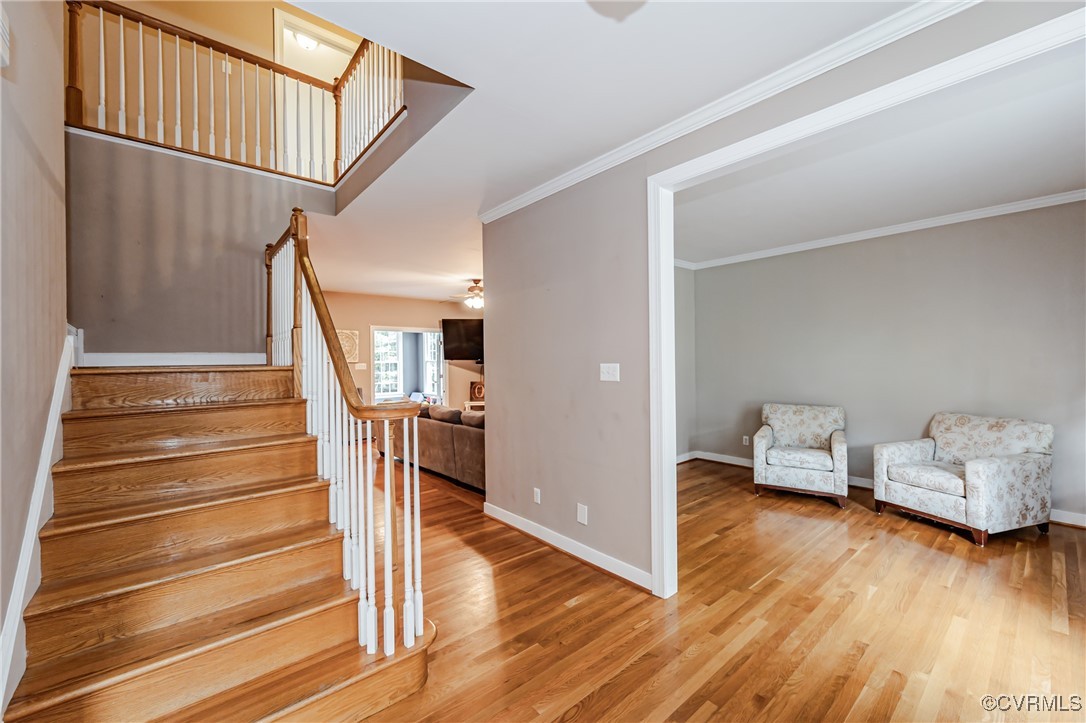 12100 Club Ridge Drive Chester, VA 23836 - Photo 5 of 33 a view of entryway and hall with wooden floor