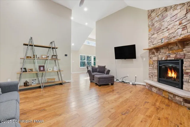 a bedroom with a bed and a lamp