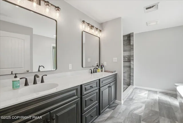 a backyard of a house with seating space