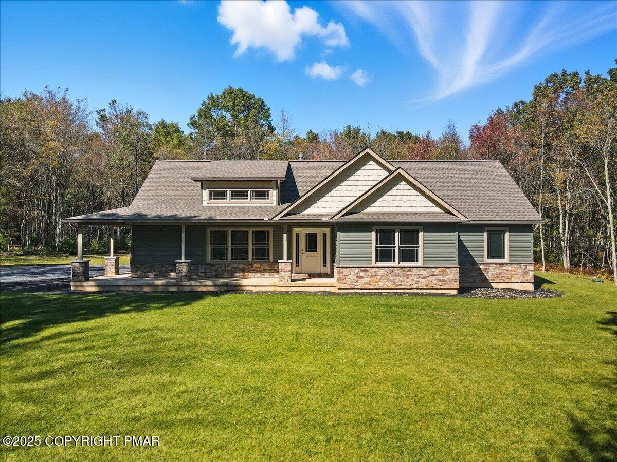 154 Sterner Run Road Kunkletown, PA 18058 - Photo 3 of 104 a front view of a house with a garden
