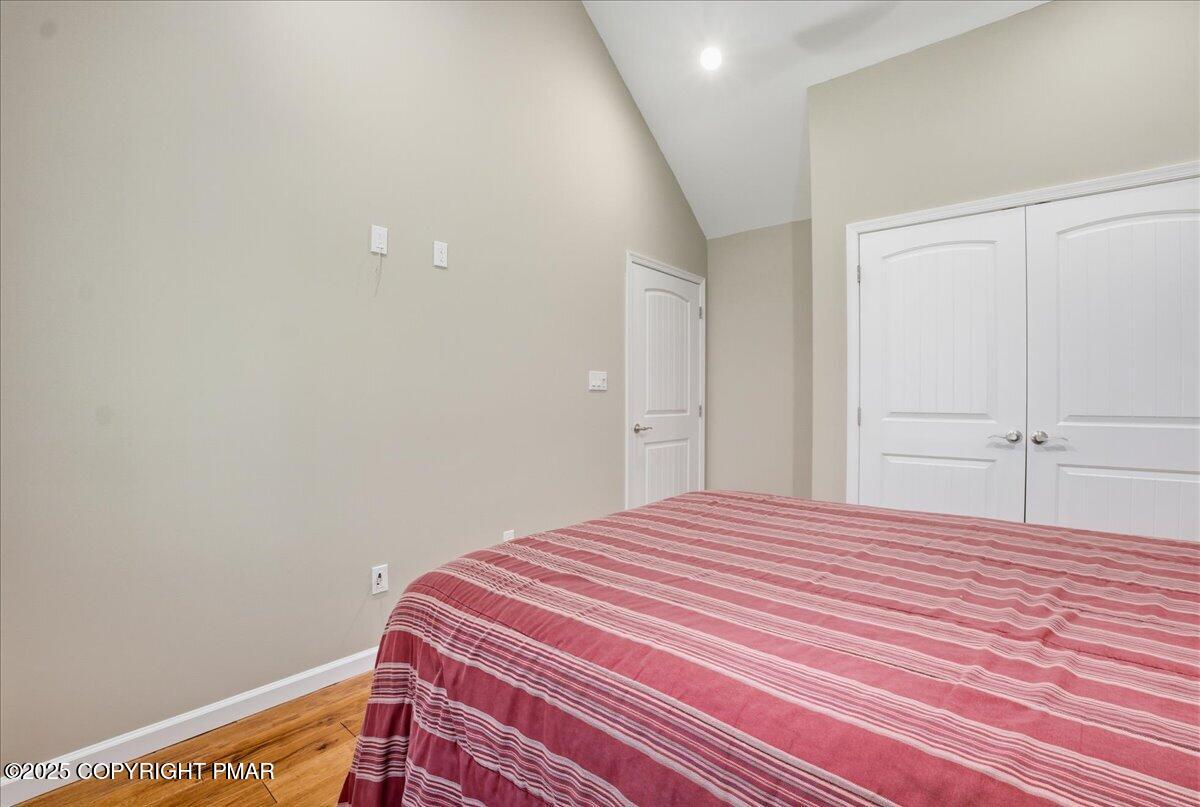 154 Sterner Run Road Kunkletown, PA 18058 - Photo 34 of 104 a bedroom with a bed and a lamp