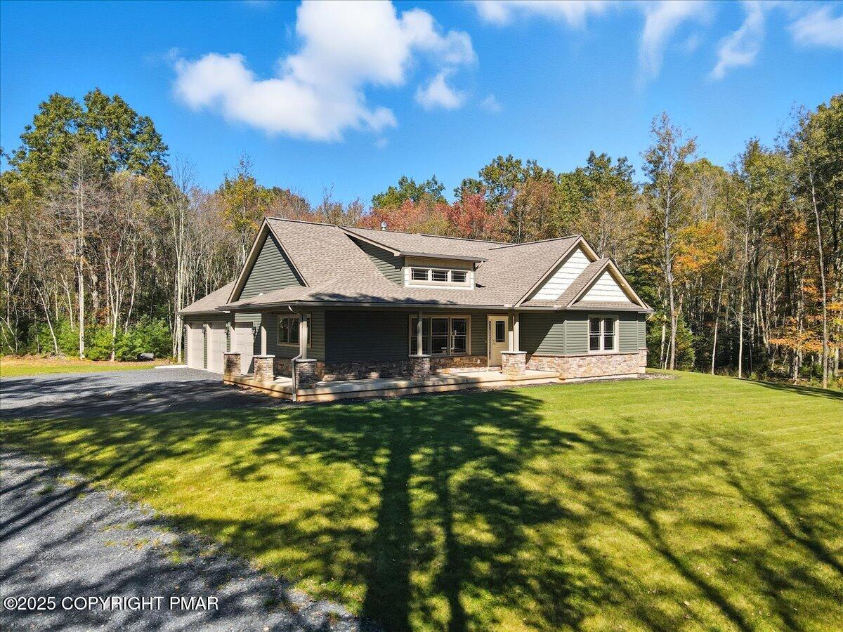 154 Sterner Run Road Kunkletown, PA 18058 - Photo 4 of 104 a front view of a house with yard and green space