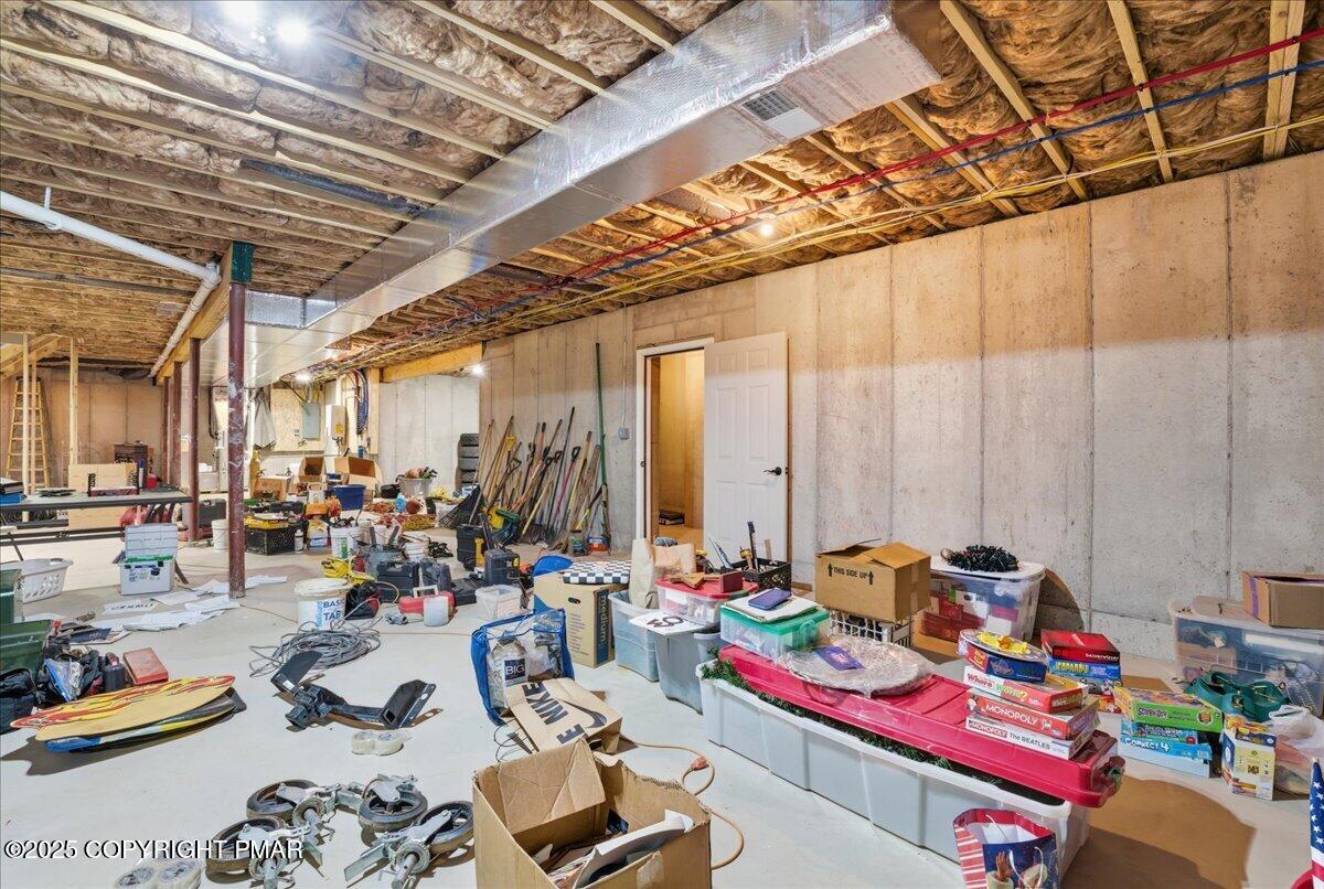 154 Sterner Run Road Kunkletown, PA 18058 - Photo 44 of 104 a room with gym equipment and lots of furniture