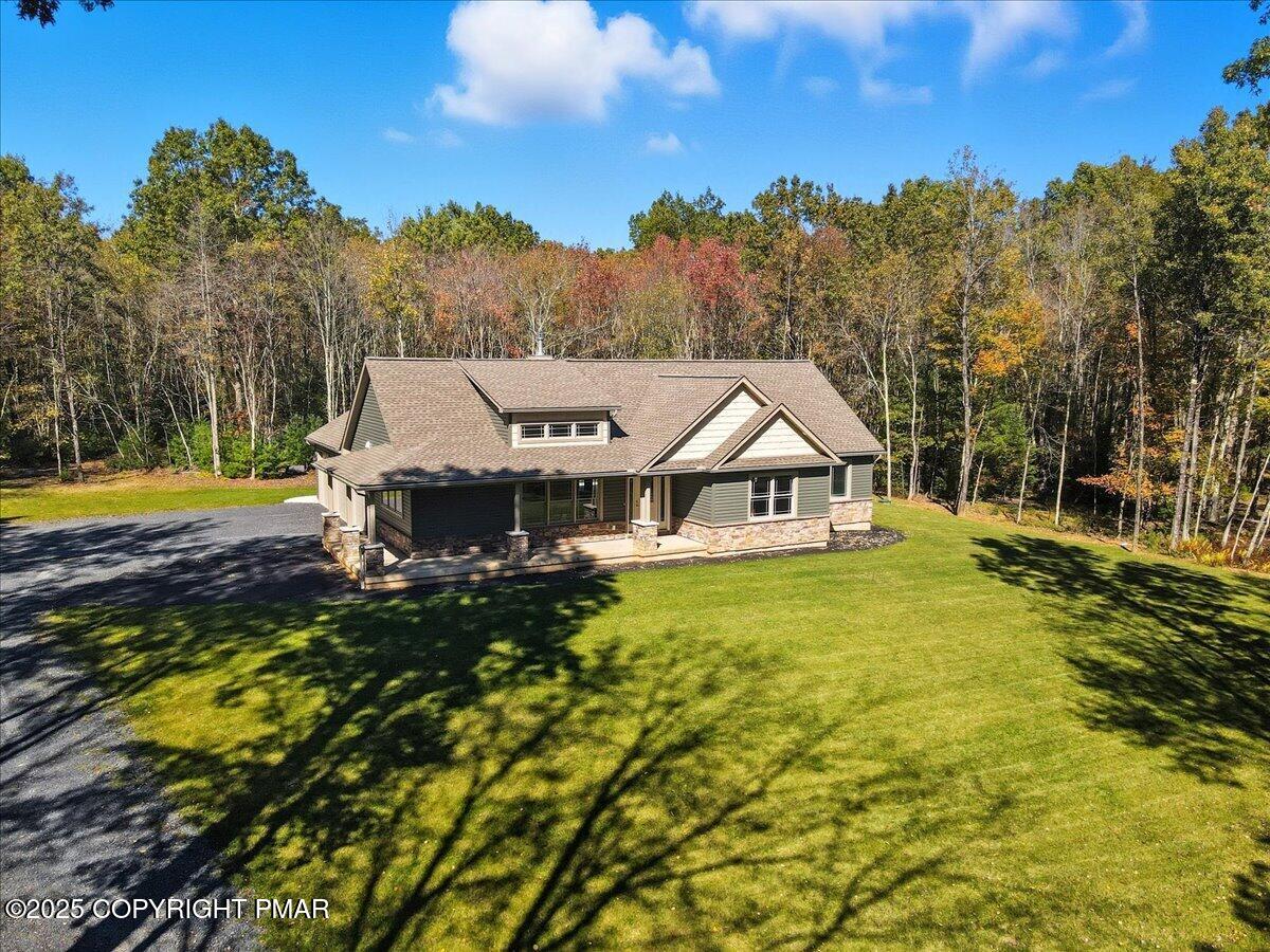 154 Sterner Run Road Kunkletown, PA 18058 - Photo 77 of 104 a view of a house with a big yard and large trees