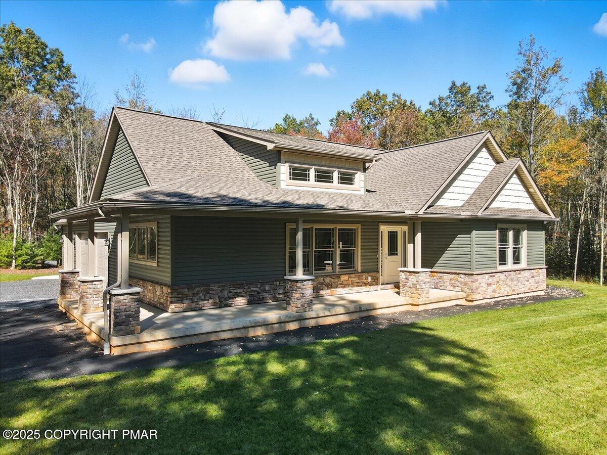 154 Sterner Run Road Kunkletown, PA 18058 - Photo 8 of 104 a front view of a house with garden