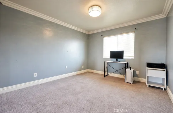 an empty room with furniture