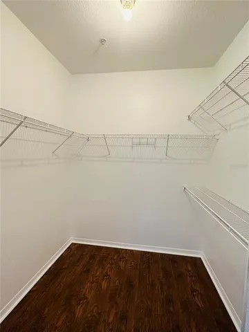 a view of a room with racks on the wall