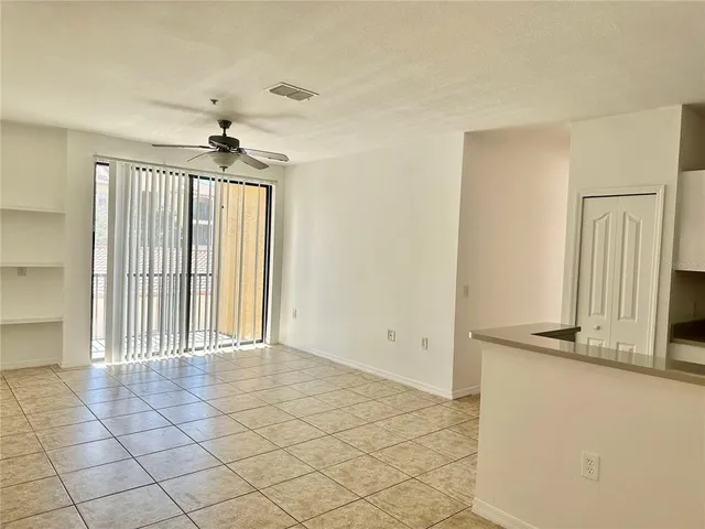 a view of a room with a large window