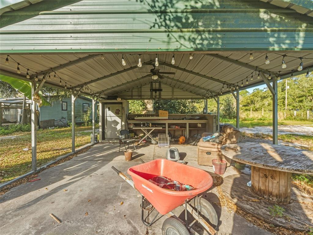 7275 Knowles Road Polk City, FL 33868 - Photo 4 of 39 a outdoor view with a sitting space