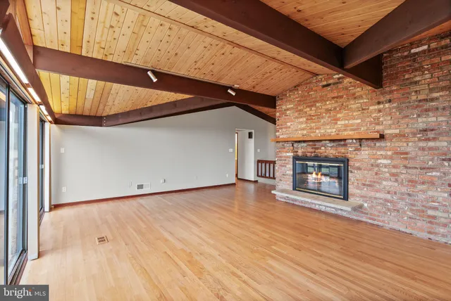 a bathroom with a double vanity sink and mirror