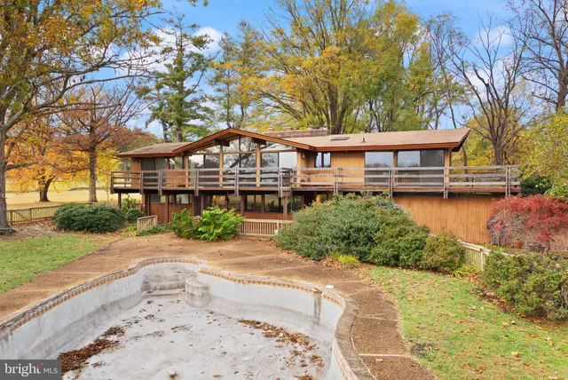 a picture of a bathroom with a shower
