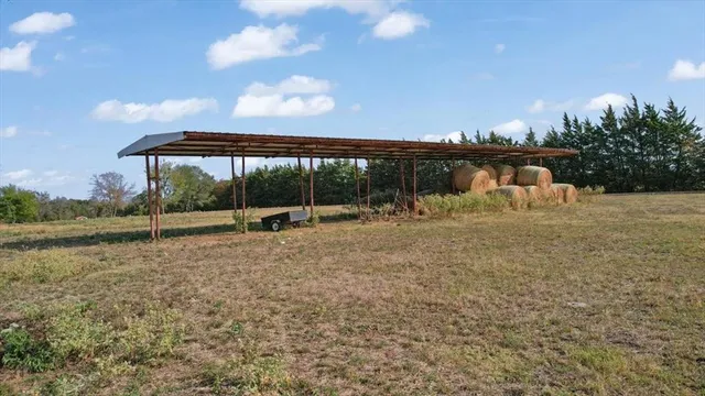a view of backyard with green space