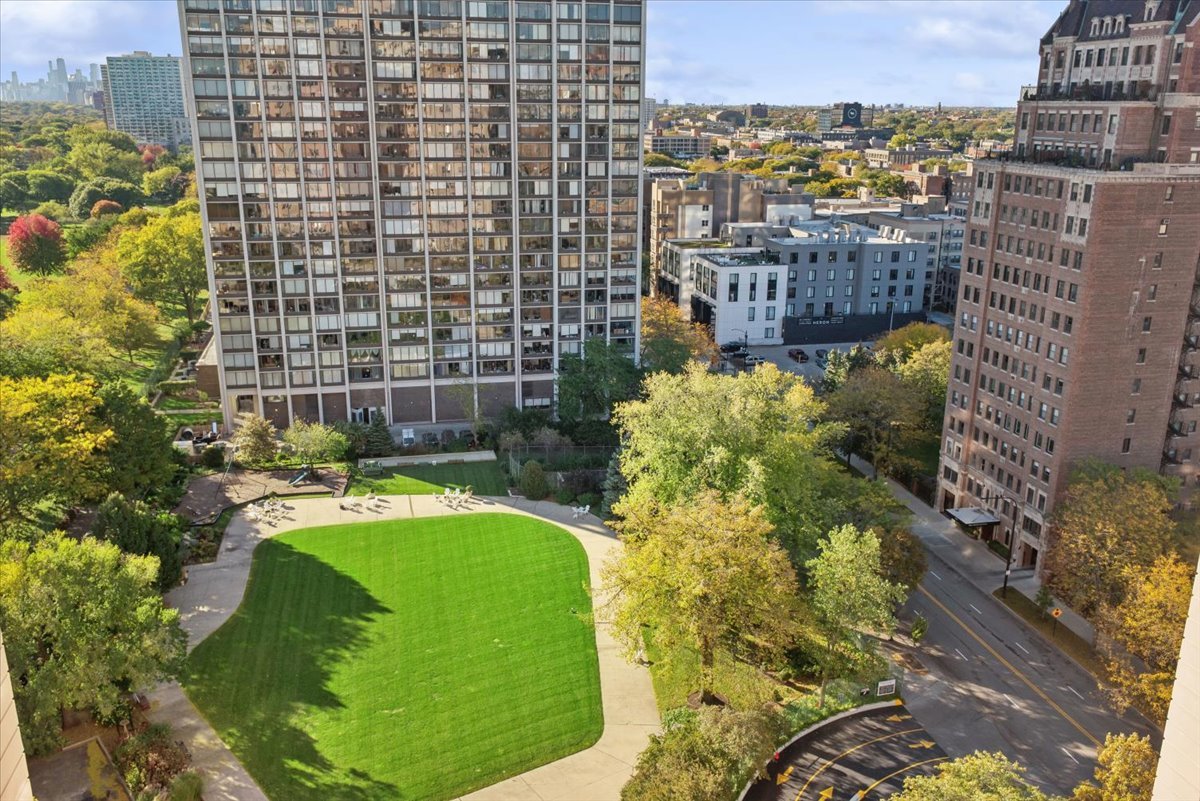 5555 North Sheridan Road, Unit 1504 Chicago, IL 60640 - Photo 9 of 18 a view of a swimming pool with a patio