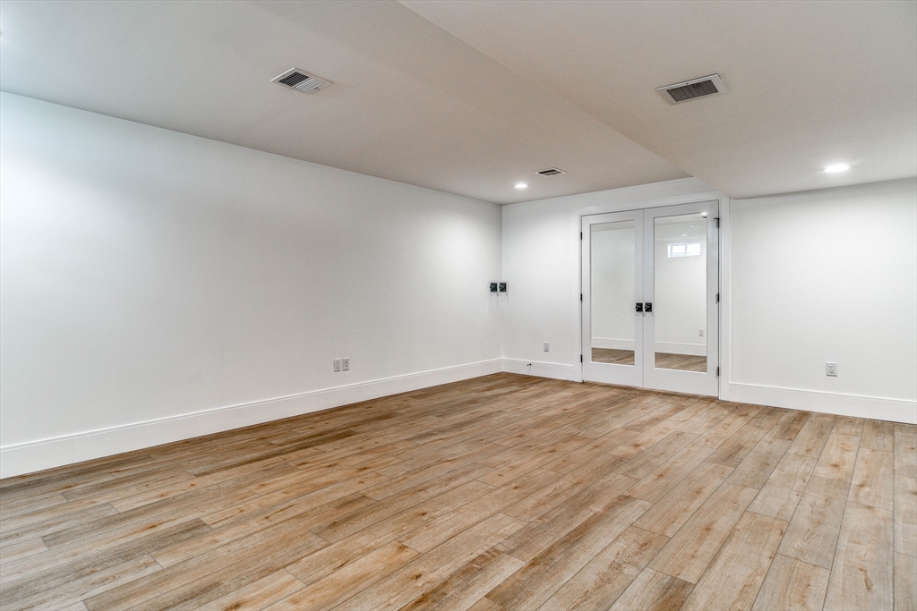 1 Winter Street Natick, MA 01760 - Photo 23 of 26 wooden floor in an empty room