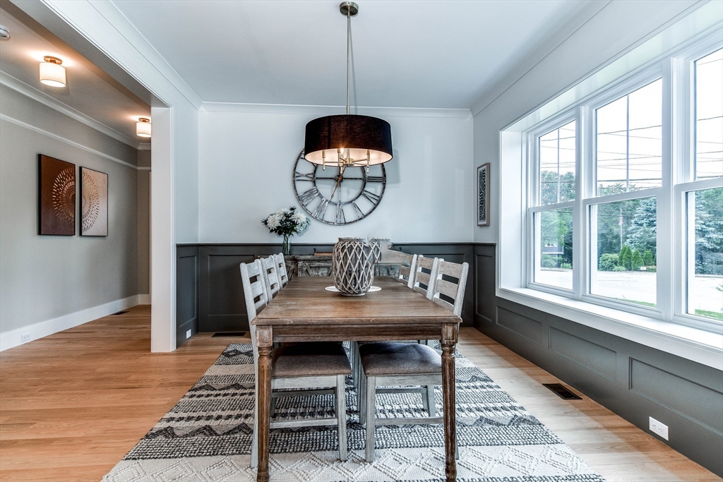 1 Winter Street Natick, MA 01760 - Photo 5 of 26 a view of a dining room with furniture window and wooden floor