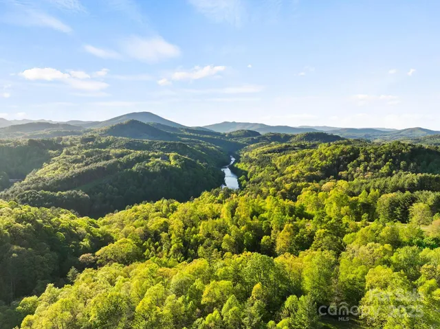 a view of a lake with a mountain