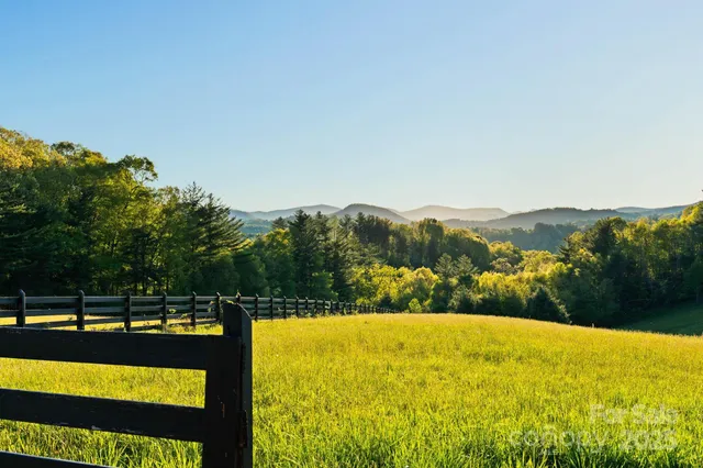 a view of a swimming pool with a mountain view