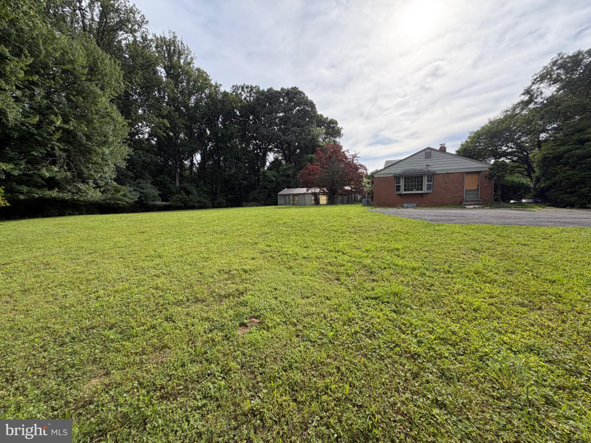 913 Windmill Lane Silver Spring, MD 20905 - Photo 2 of 19 Spacious yard with serene surroundings.