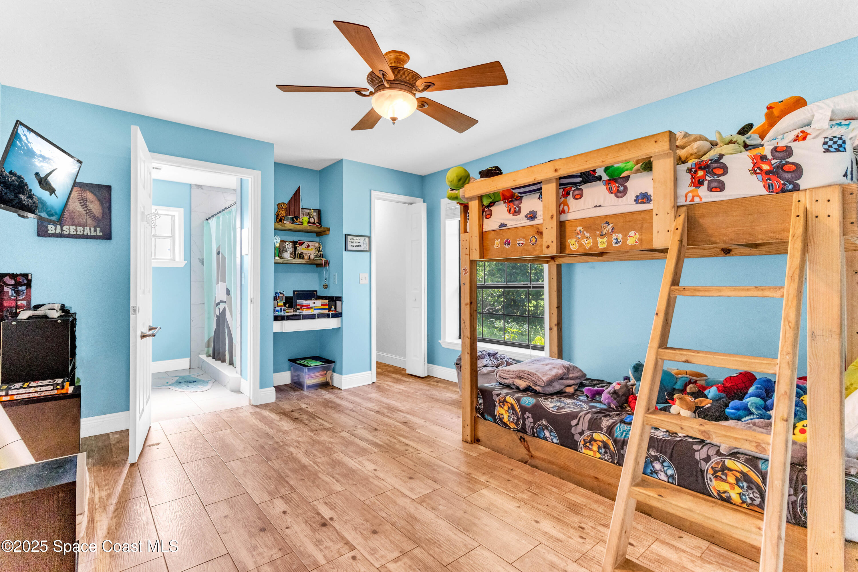 1980 Corey Road Malabar, FL 32950 - Photo 28 of 42 a bed room with a bed and a window