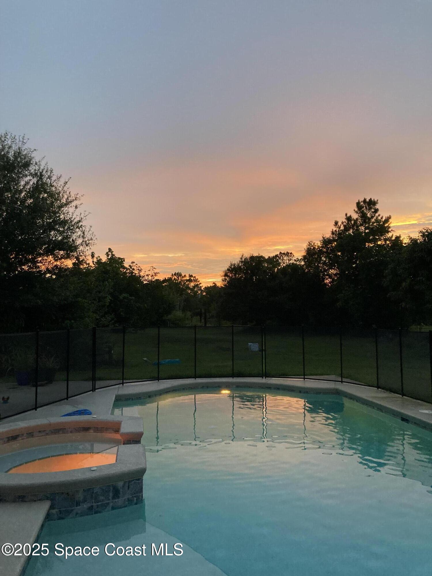 1980 Corey Road Malabar, FL 32950 - Photo 42 of 42 a view of swimming pool with a yard