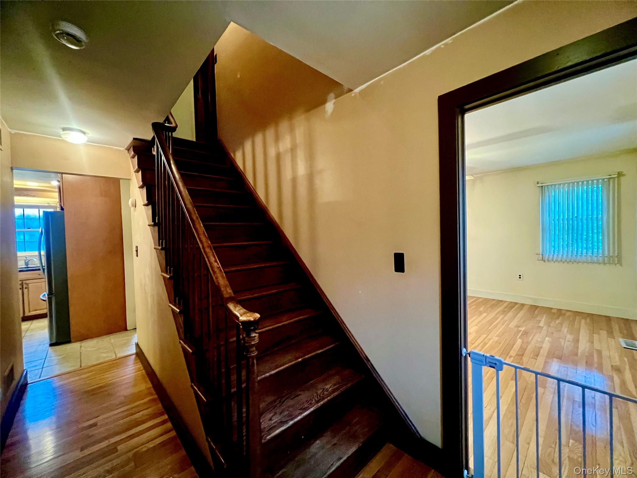57 Hubbard Road Middletown, NY 10940 - Photo 13 of 30 a view of a hallway with wooden floor and staircase