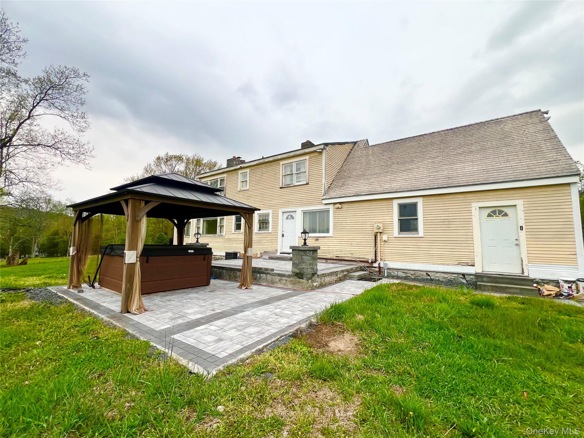 57 Hubbard Road Middletown, NY 10940 - Photo 26 of 30 a front view of a house with patio and yard