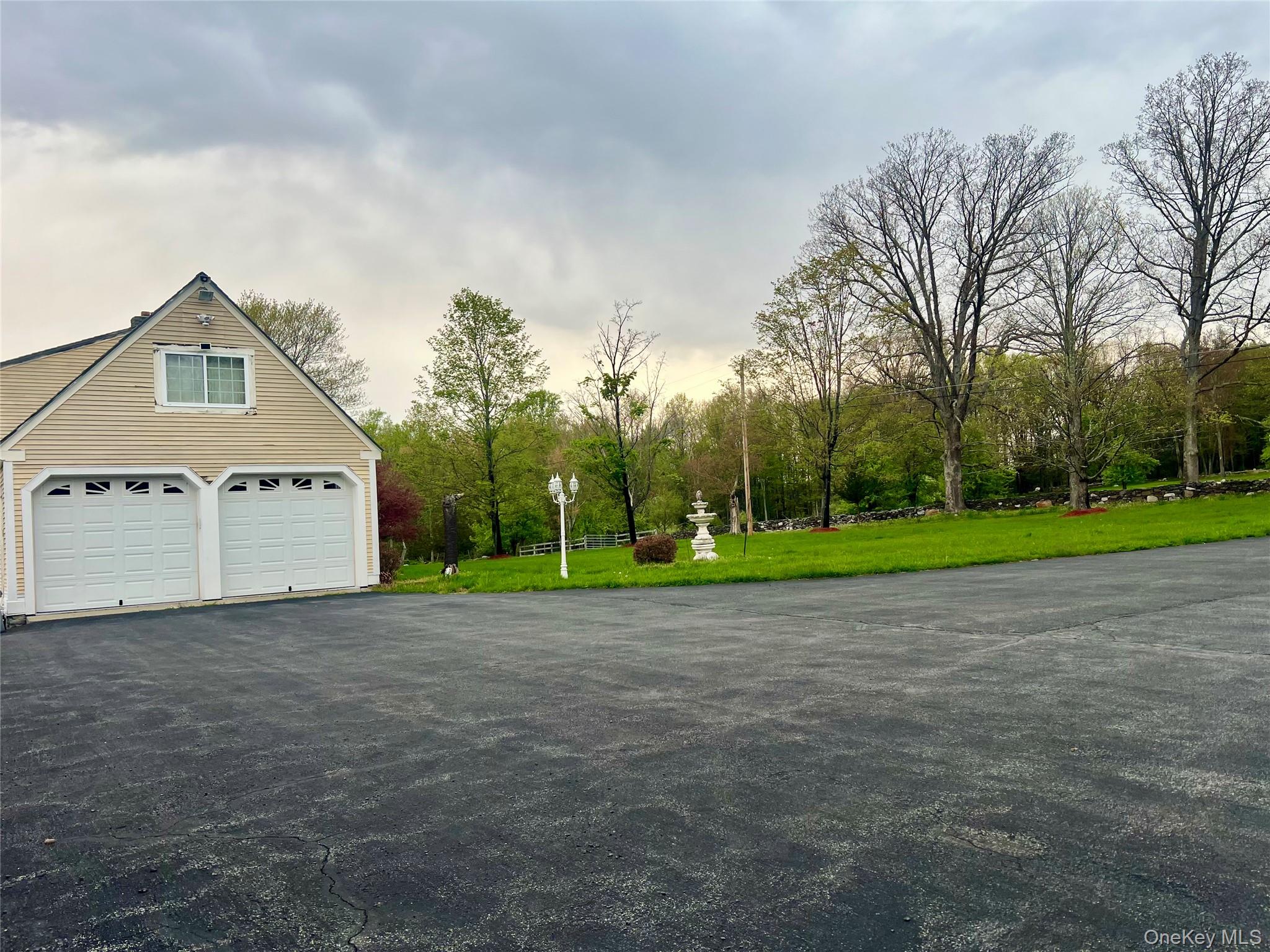 57 Hubbard Road Middletown, NY 10940 - Photo 28 of 30 a view of a house with a big yard and large trees