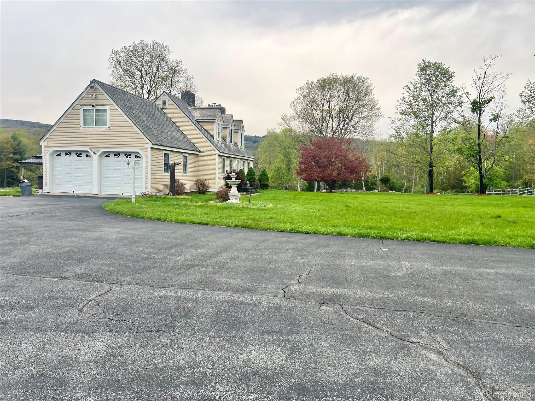 57 Hubbard Road Middletown, NY 10940 - Photo 29 of 30 a view of a big house with a yard and large trees