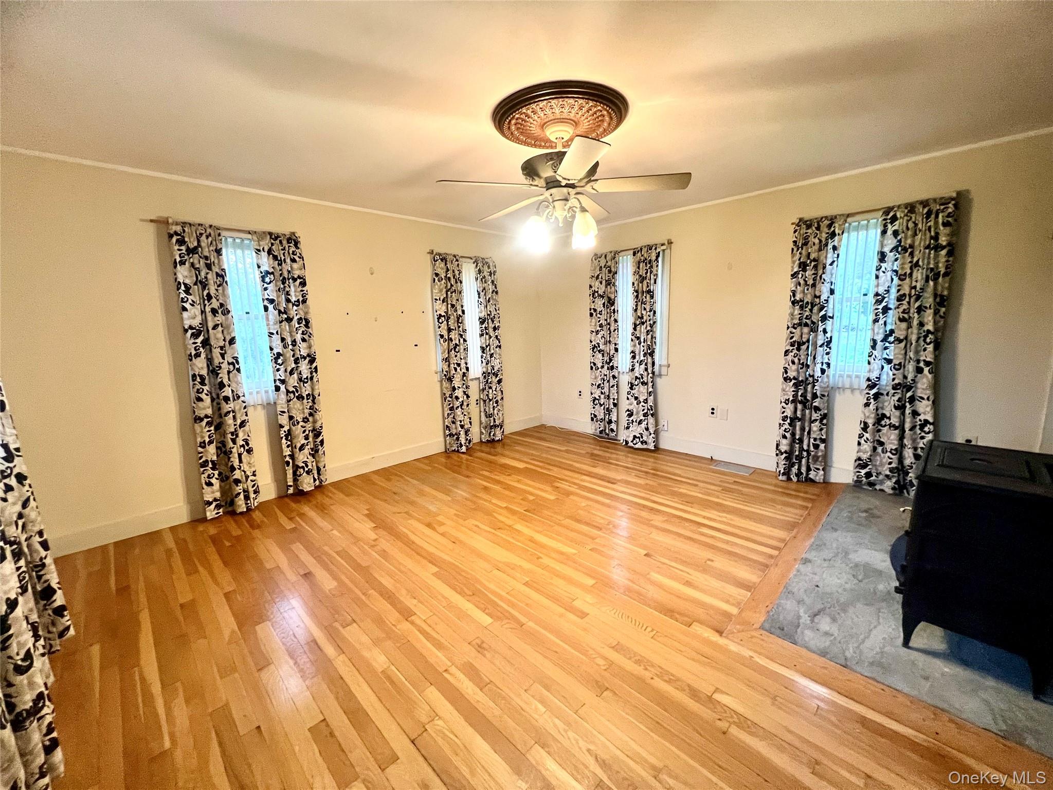 57 Hubbard Road Middletown, NY 10940 - Photo 5 of 30 a view of empty room with wooden floor