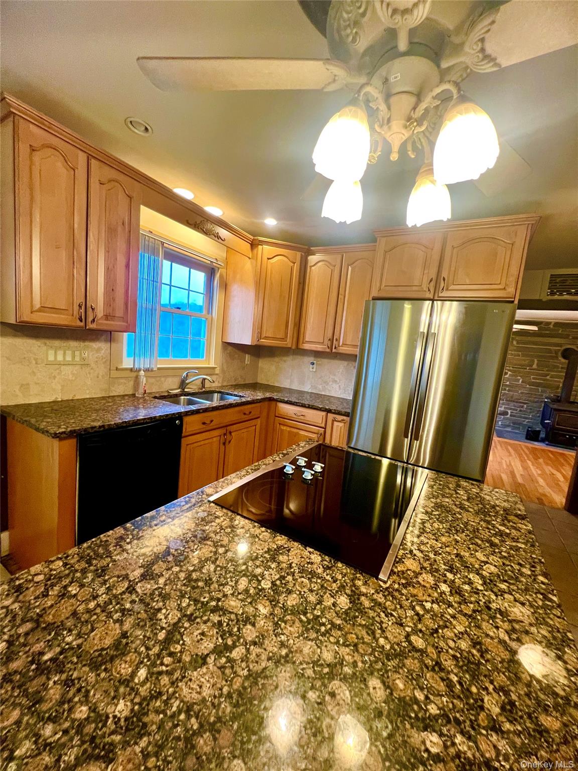 57 Hubbard Road Middletown, NY 10940 - Photo 8 of 30 a kitchen with stainless steel appliances granite countertop a sink stove and refrigerator