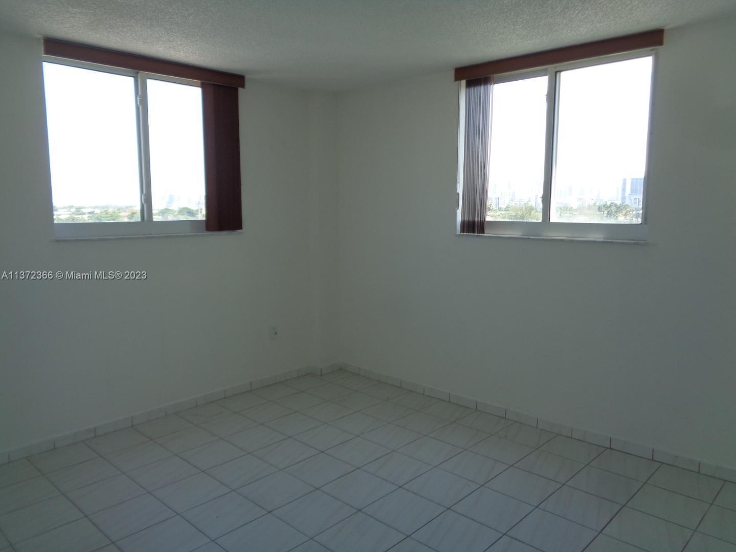Allapattah Miami, FL 33142 - Photo 12 of 46 an empty room with a window