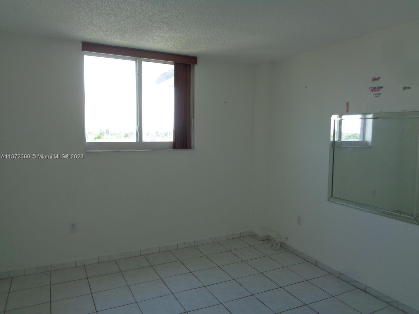 Allapattah Miami, FL 33142 - Photo 18 of 46 an empty room with a window