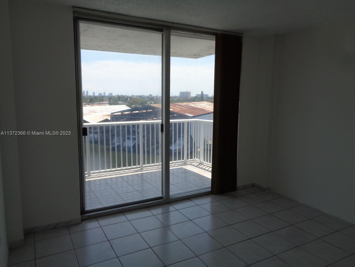 Allapattah Miami, FL 33142 - Photo 25 of 46 a view of a glass entrance and a window