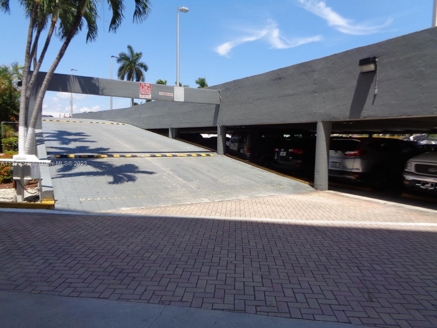Allapattah Miami, FL 33142 - Photo 41 of 46 a kitchen with kitchen island sink and stove