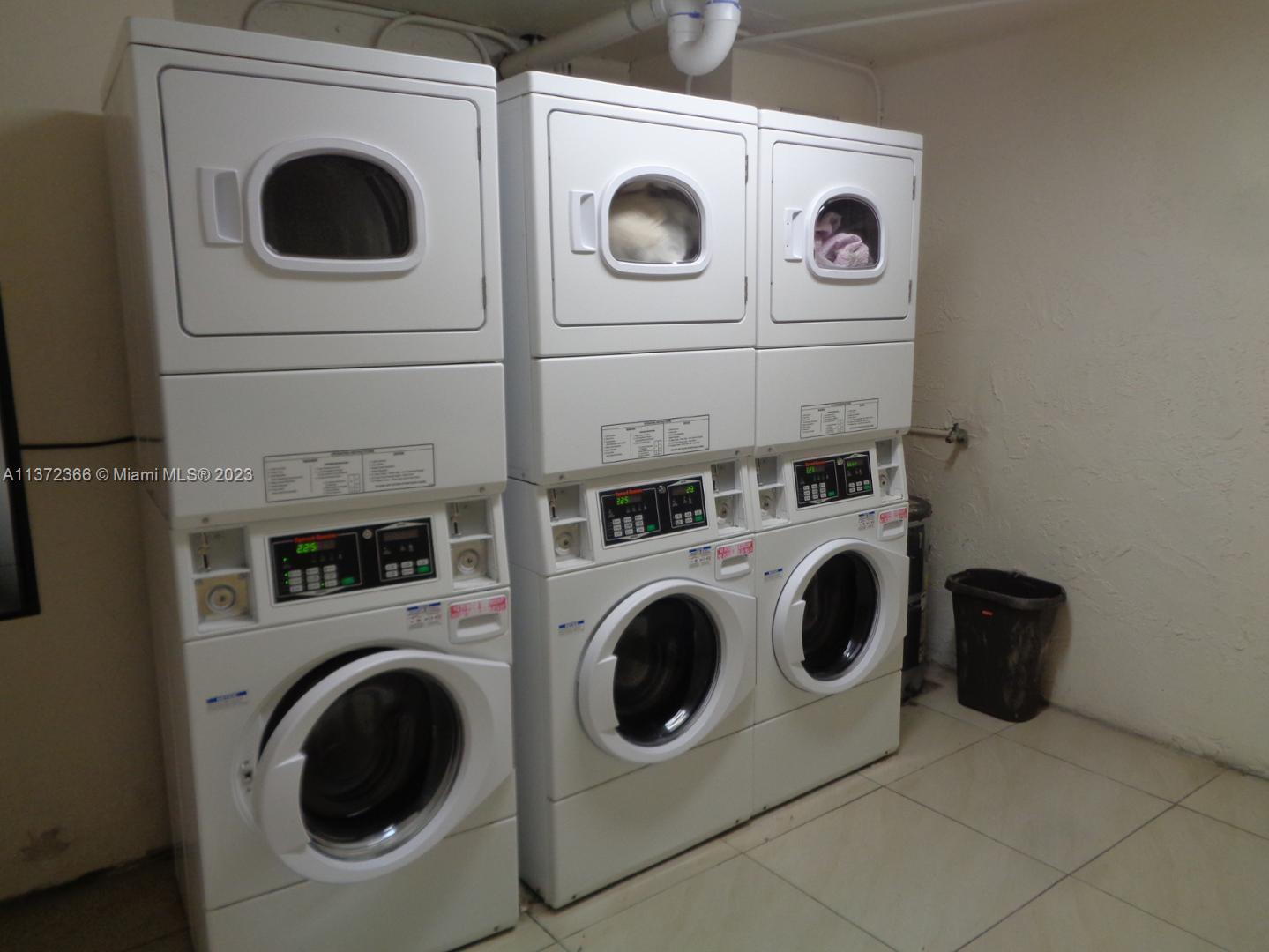 Allapattah Miami, FL 33142 - Photo 44 of 46 a utility room with dryer and washer