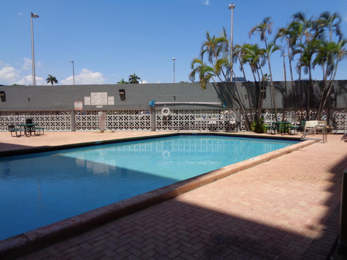 Allapattah Miami, FL 33142 - Photo 45 of 46 a view of a swimming pool with a yard