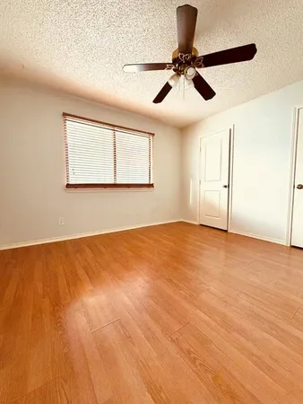 a view of room with ceiling fan
