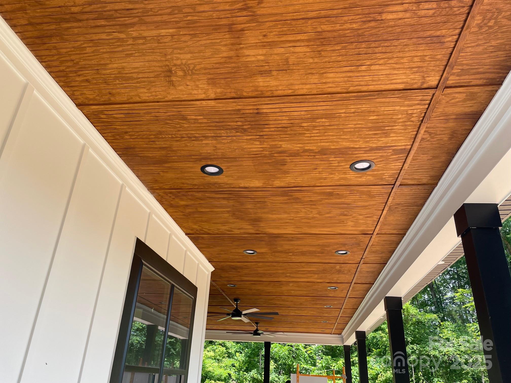 6855 Union Road Gastonia, NC 28056 - Photo 15 of 16 a view of roof deck with wooden floor and outdoor seating