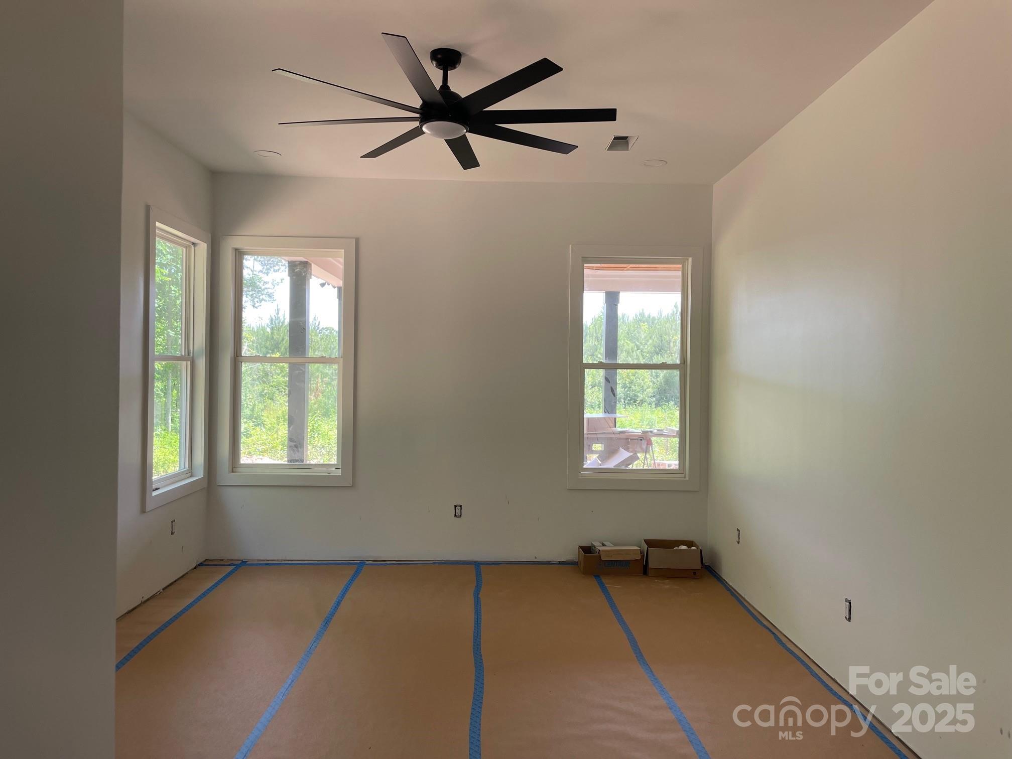 6855 Union Road Gastonia, NC 28056 - Photo 10 of 16 an empty room with windows