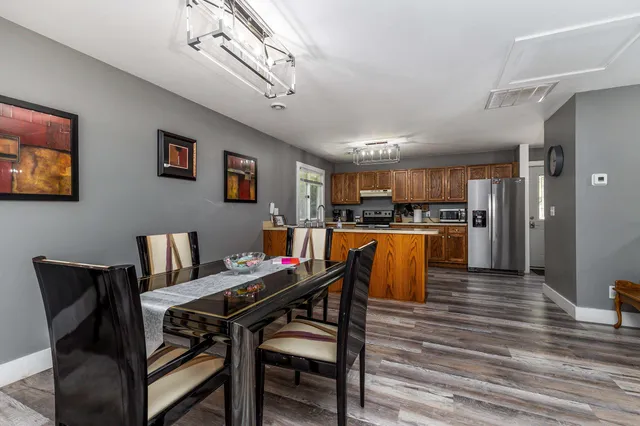 a view of a workspace with furniture