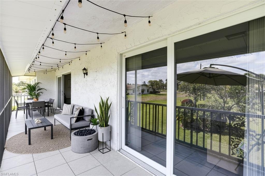 355 Palm Drive, Unit 732 Naples, FL 34112 - Photo 32 of 50 virtual staged balcony