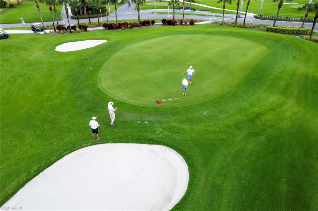 355 Palm Drive, Unit 732 Naples, FL 34112 - Photo 48 of 50 View of home's community with view of golf course