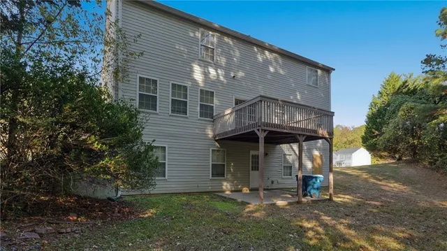 a picture of a book and a white wall
