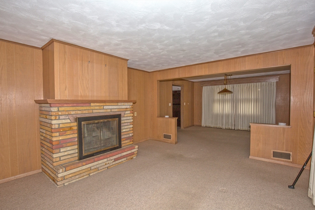 104 D Four Bridges Road Somers, CT 06071 - Photo 17 of 40 a view of empty room with fireplace