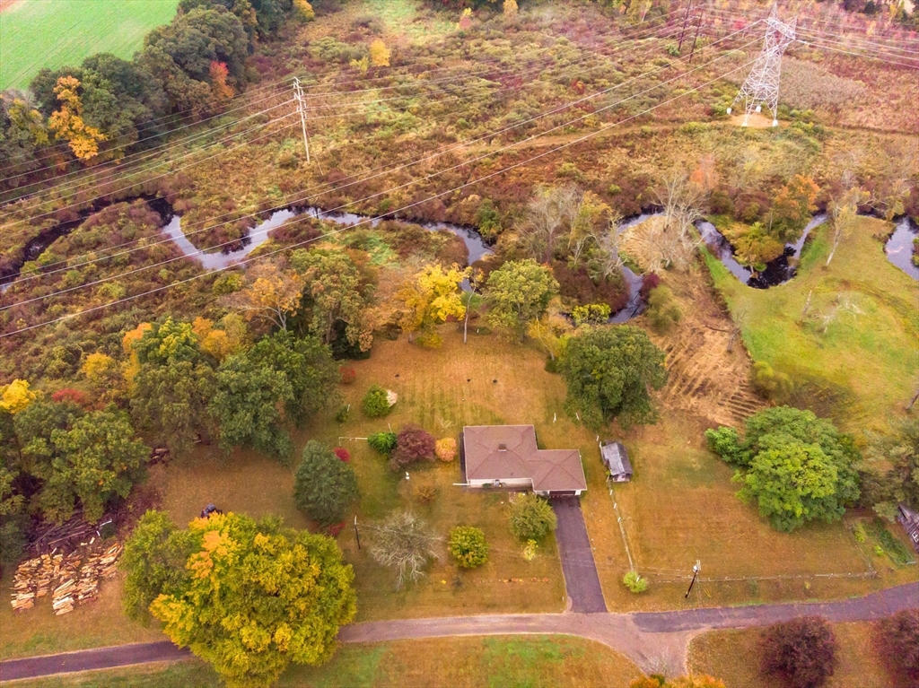 104 D Four Bridges Road Somers, CT 06071 - Photo 2 of 40 an aerial view of residential houses with outdoor space