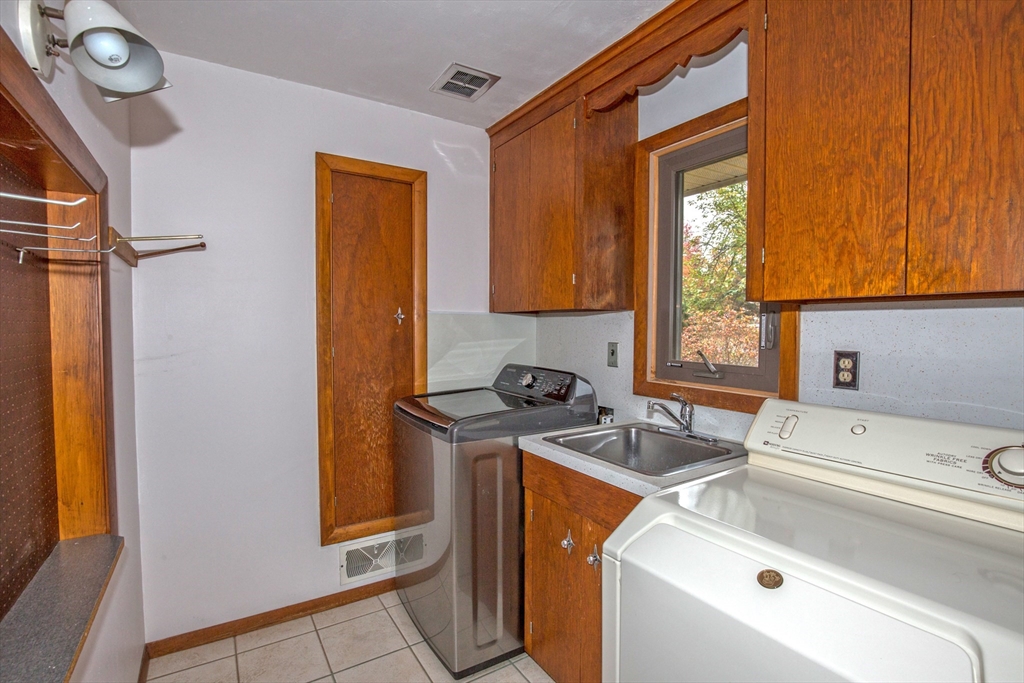 104 D Four Bridges Road Somers, CT 06071 - Photo 23 of 40 a bathroom with a sink a toilet and shower curtain
