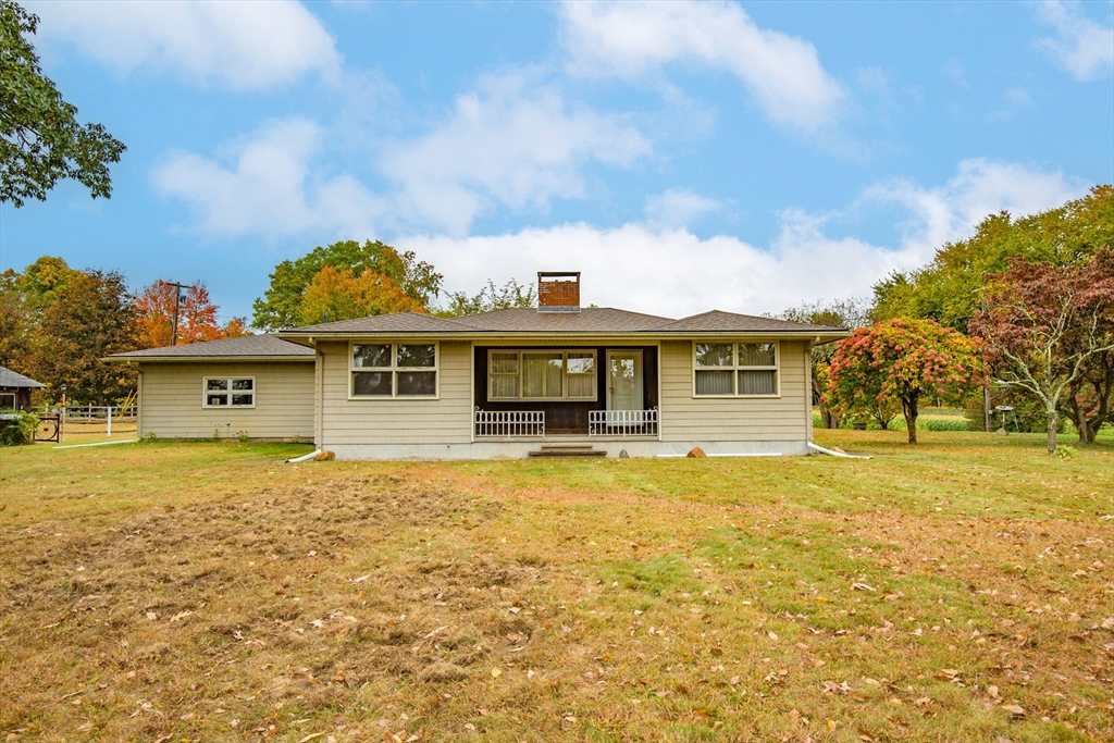 104 D Four Bridges Road Somers, CT 06071 - Photo 34 of 40 a front view of a house with a yard