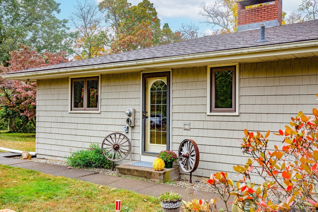 104 D Four Bridges Road Somers, CT 06071 - Photo 5 of 40 a front view of a house with patio