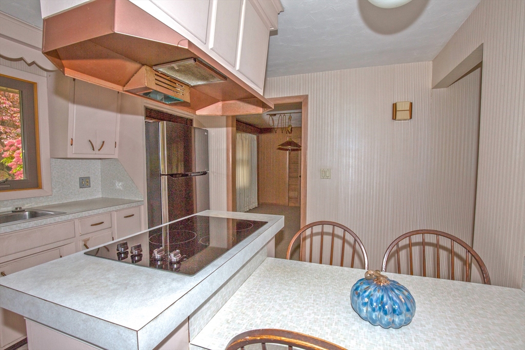 104 D Four Bridges Road Somers, CT 06071 - Photo 10 of 40 a kitchen with a sink a counter top space and stainless steel appliances