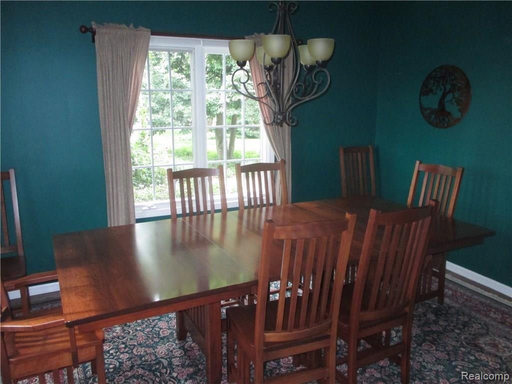 11465 Bruce N Lane Romeo, MI 48065 - Photo 26 of 43 Formal Dining .. Wood Floors .. This is What Family Gatherings Need!